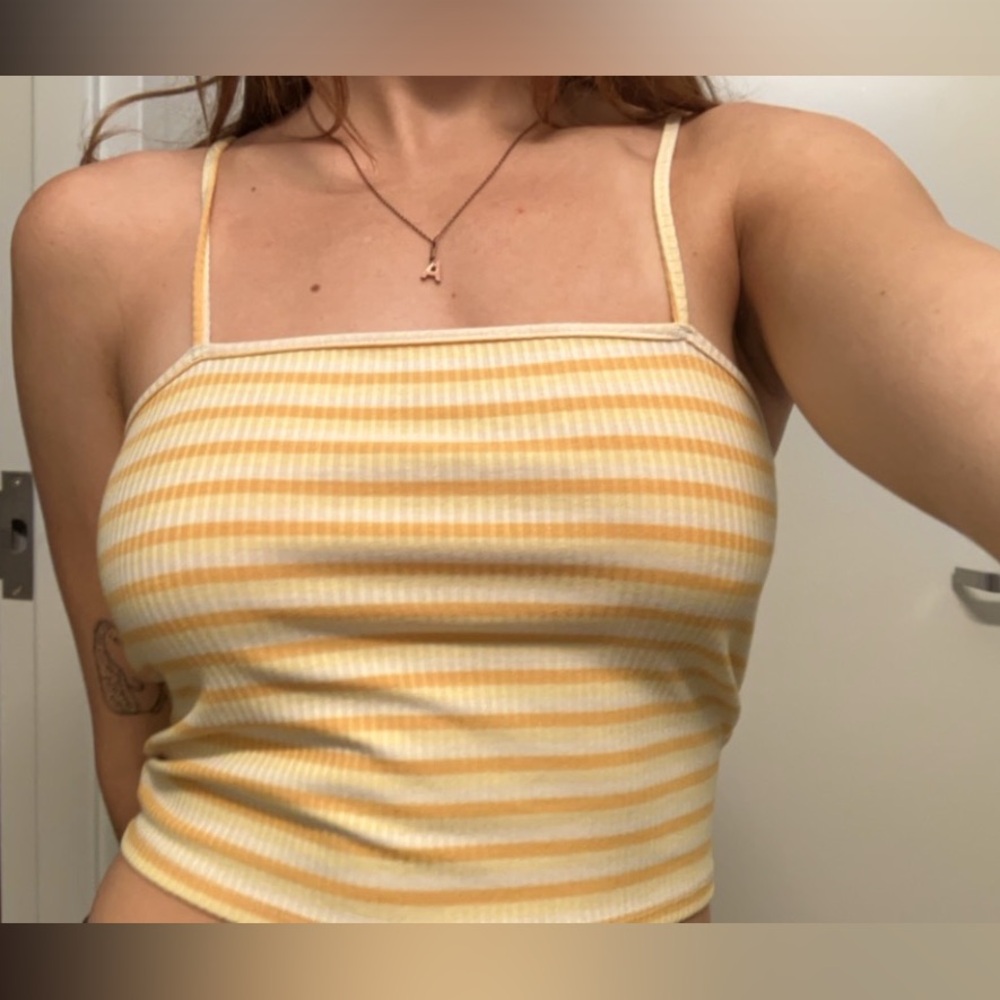cute white and yellow striped shirt, perfect for summer!